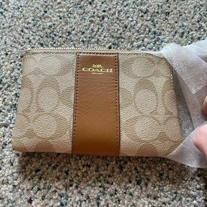 Small Tan With Brown C's Coach Wristlet